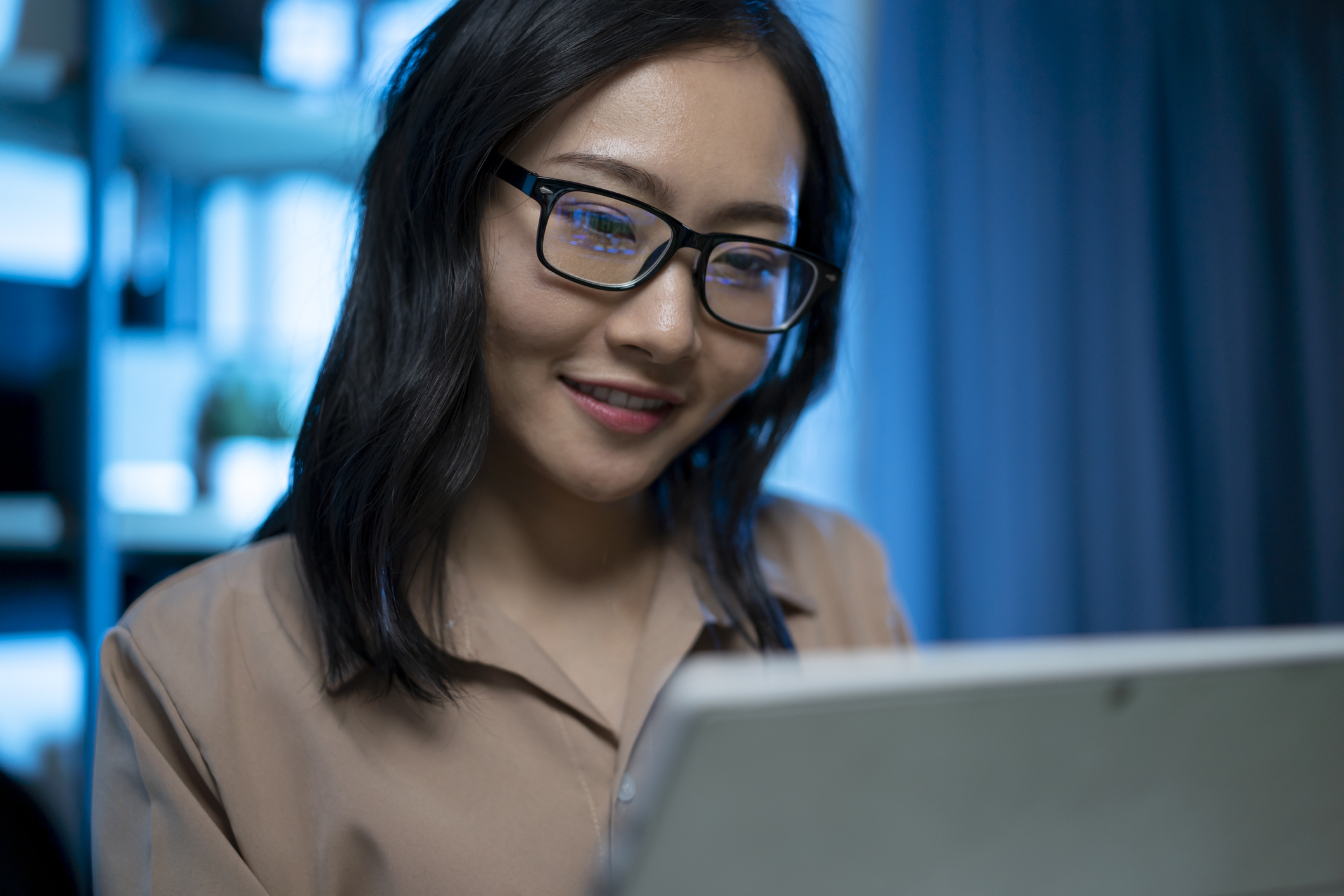 Person looking at laptop