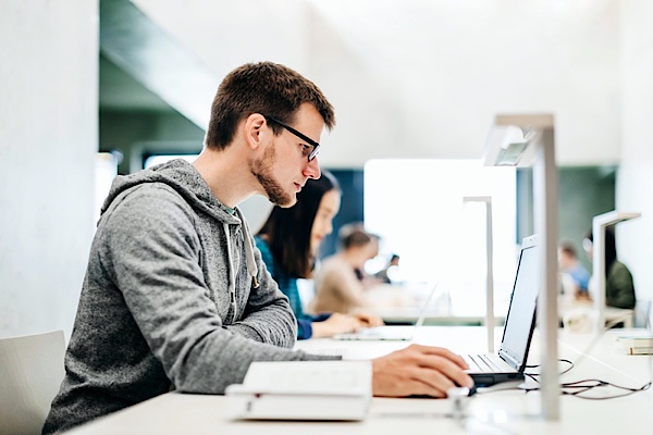 Man working on laptop computer